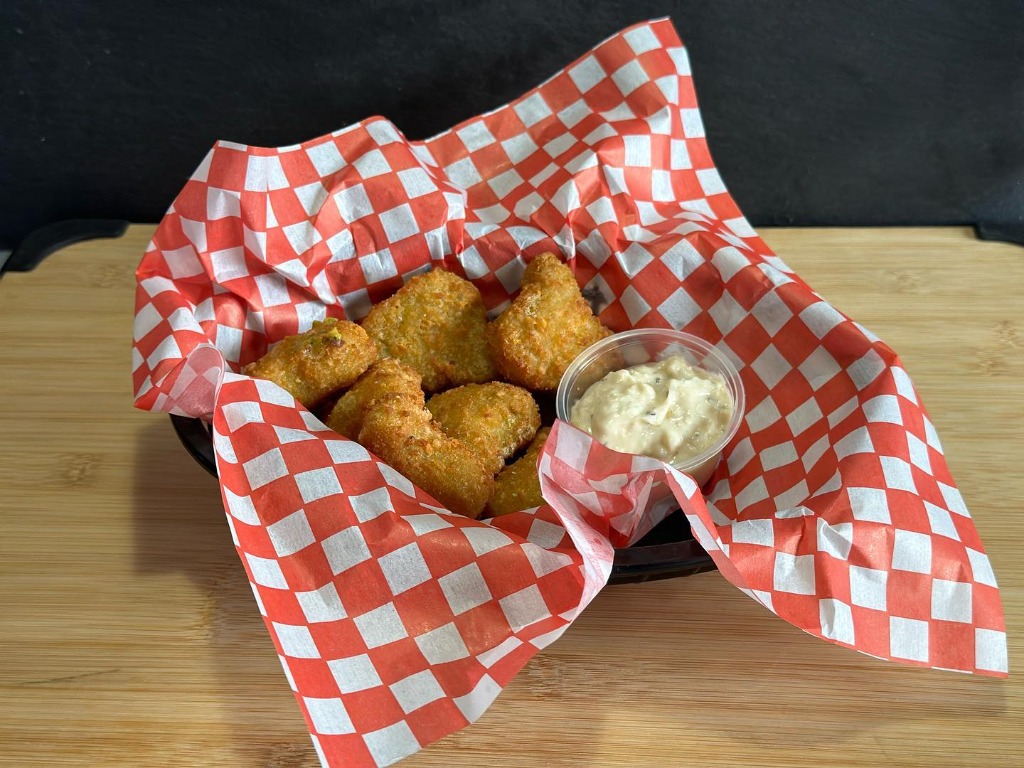 Golden crispy nuggets with dipping sauce