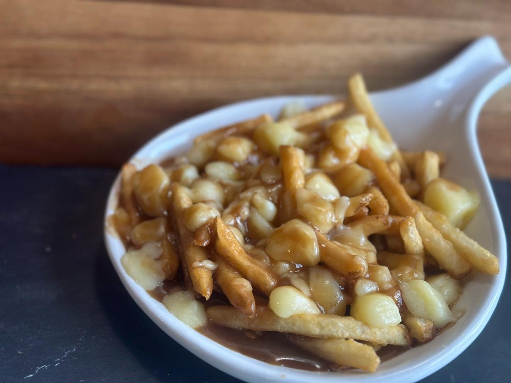 Delicious Poutine with rich gravy and cheese curds